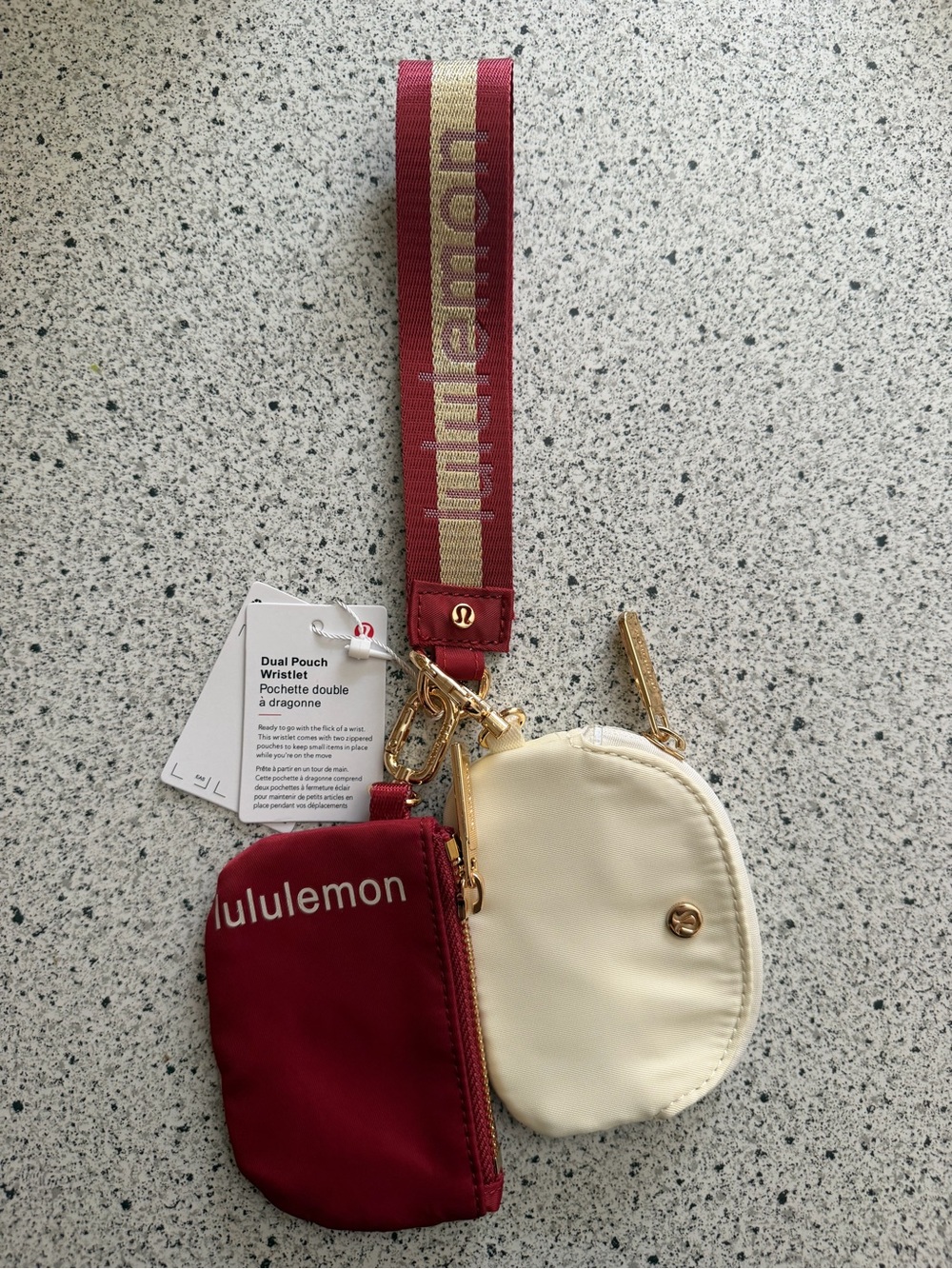 lululemon dual pouch wristlet in burgundy and cream with gold hardware